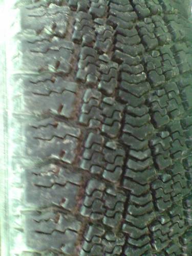 Продам четыри шины бельшина -227 зима 175/65R14 , почти новая 