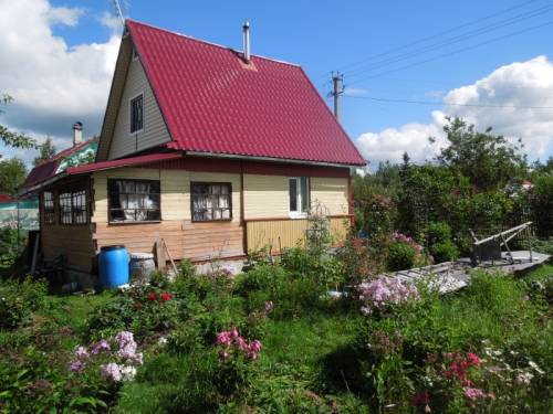 Рубленый из дерева дачный дом с участком в массиве Новинка (сад-во “Ракитинка“)
