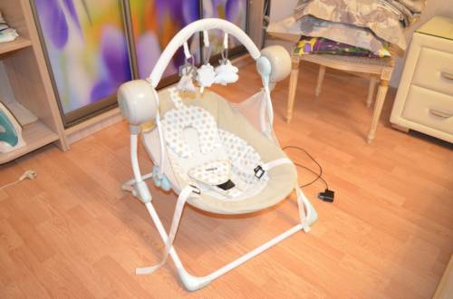 Продам детские электронные качели.Babyton