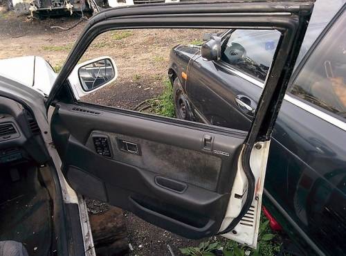 Обшивка двери передняя правая на Honda Civic EF2 D15B