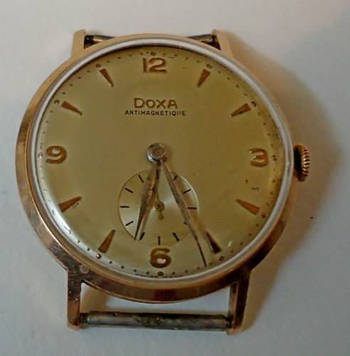Золотые швейцарские часы Doxa (винтажные)