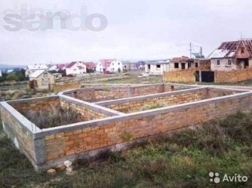 продам участок с начатым строительством