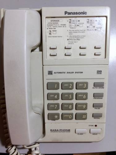 Настольный телефон “Panasonic“
