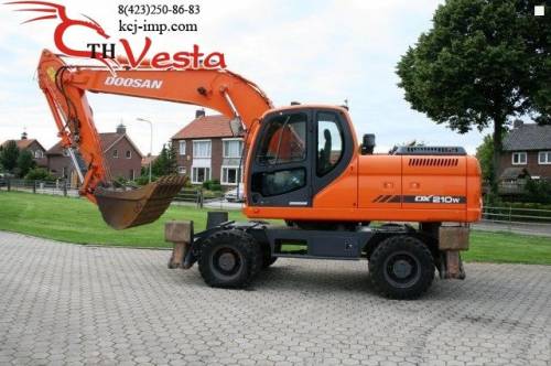 колесный экскаватор Doosan DX 210W, 2005 года выпуска.  